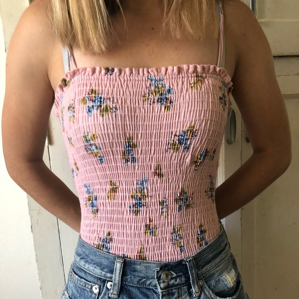 Adorable pink with petite flowers bodysuit.